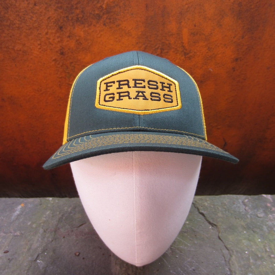 FreshGrass Trucker Hat: Green and Gold with Gold Logo